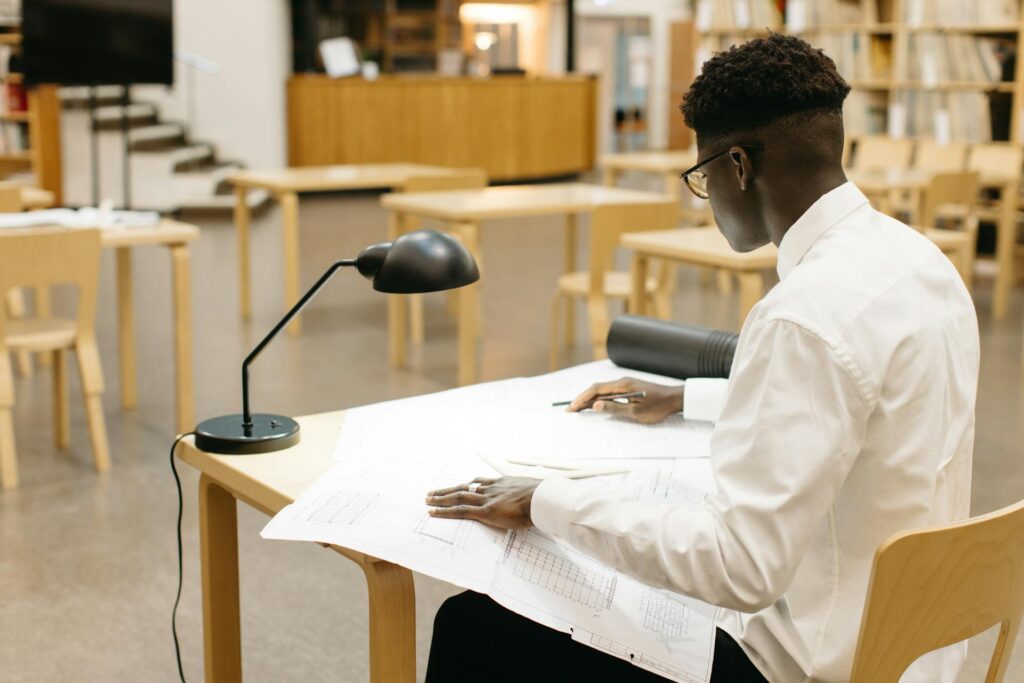 student taking notes in class