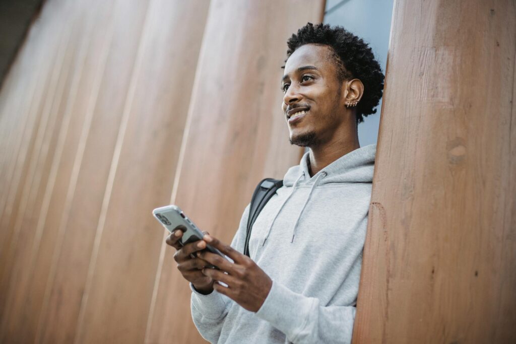 student smiling while thinking 