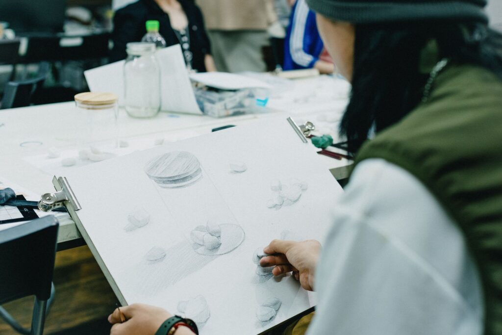 a student doing drawing