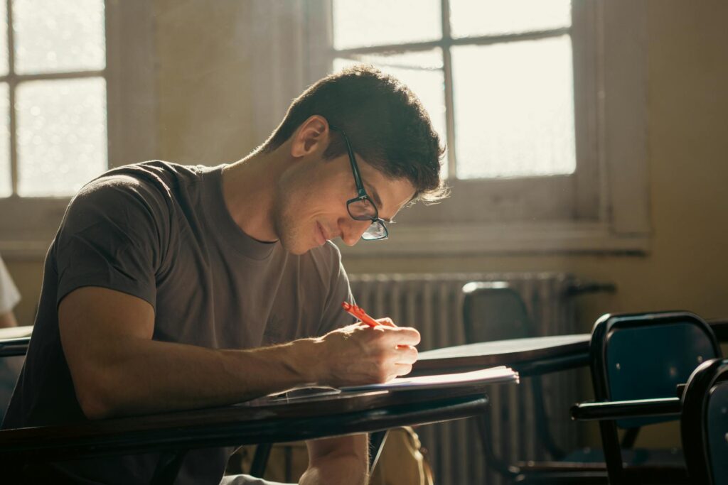 student writing in class