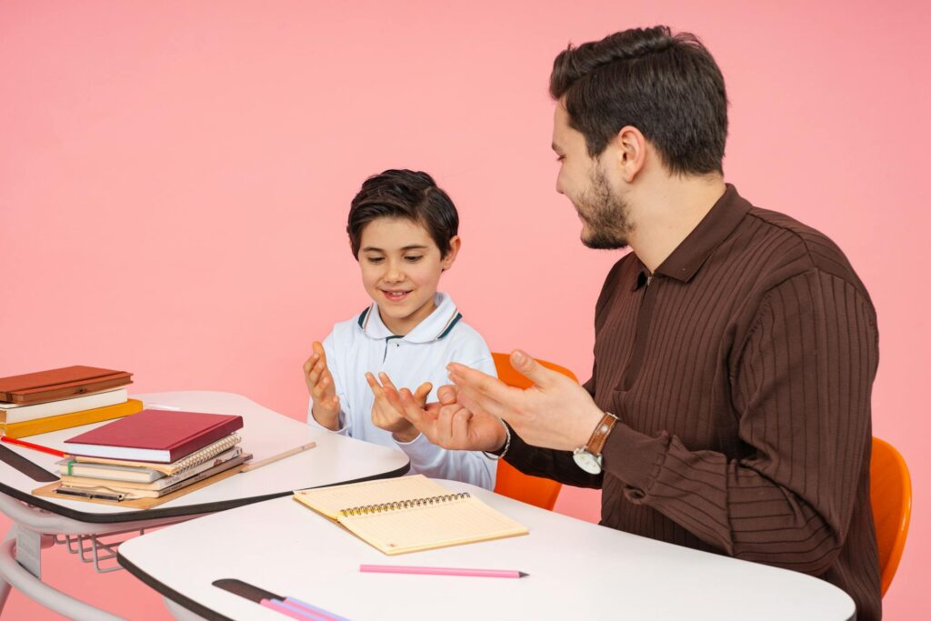 teacher talking with student