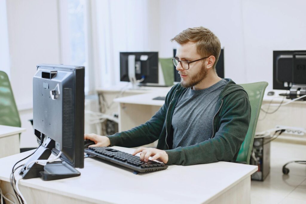 man working on computer